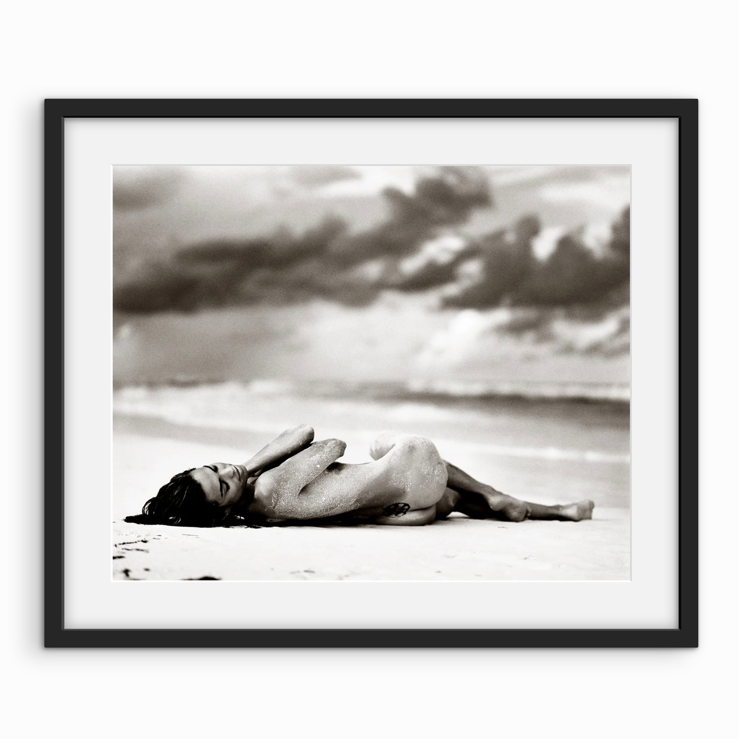 Girl Laying in Sand B&W